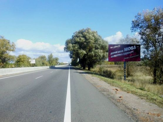 Фото рекламной плоскости по адресу смт. Калинівка, траса М-05 Київ-Одеса, км 34+655 ліво
