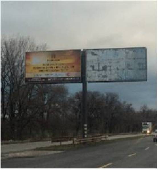 Фото рекламной плоскости по адресу г. Кривой Рог, ул. Днепропетровское шоссе, выезд, напротив кафе "CAMEL"