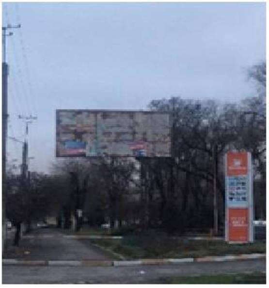 Фото рекламной плоскости по адресу г.Кривой Рог, Никопольское шоссе, въезд, заправка "Sun Oil"
