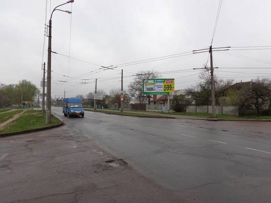 Фото рекламной плоскости по адресу Перехрестя вул.Шевченка,242 з вул.Маліновського