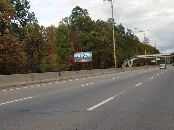 Фото рекламной плоскости по адресу Большая Кольцевая дорога (в направлении г. Вышгород)