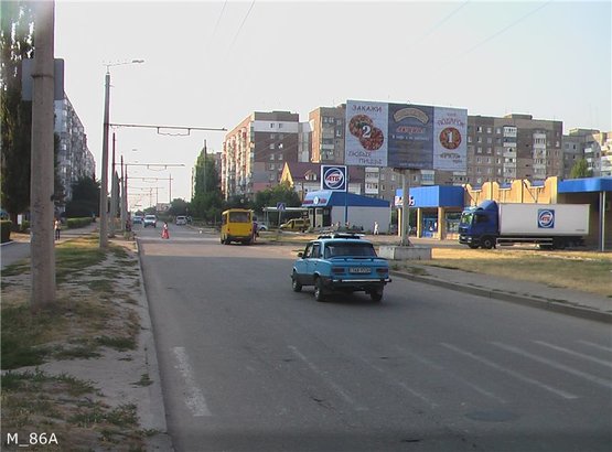 Фото рекламной плоскости по адресу ул. Жадова ( напротив АТБ)