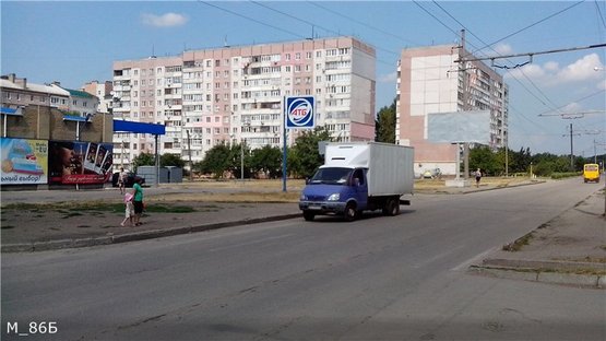 Фото рекламной плоскости по адресу ул. Жадова ( напротив АТБ)