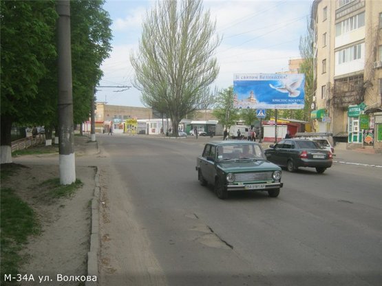 Фото рекламной плоскости по адресу ул. Волкова 1(школа)