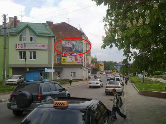 Фото рекламной плоскости по адресу вул.Л.Українки,16 (верхній)