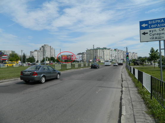Фото рекламной плоскости по адресу пр.Червоної Калини (к-тр "Довженко", місце №1, ТЦ Арсен)
