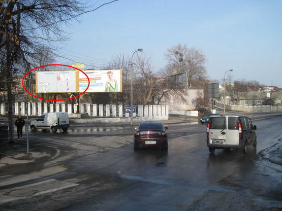 Фото рекламной плоскости по адресу вул. Поповича  -  Чернишова ( поруч з огорожею авторем.зав.) Л