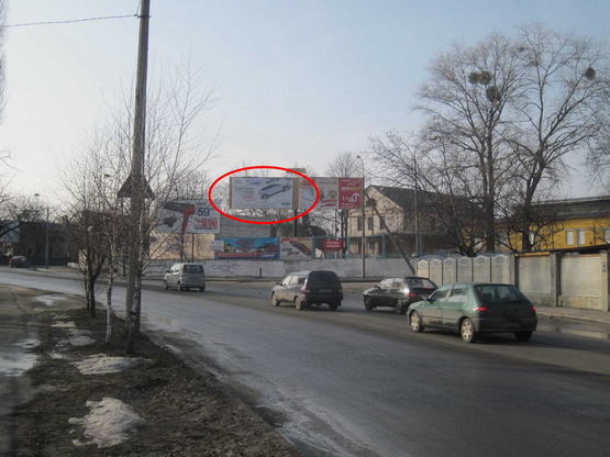 Фото рекламной плоскости по адресу вул. Поповича - Чернишова  ( ав/рем зав)