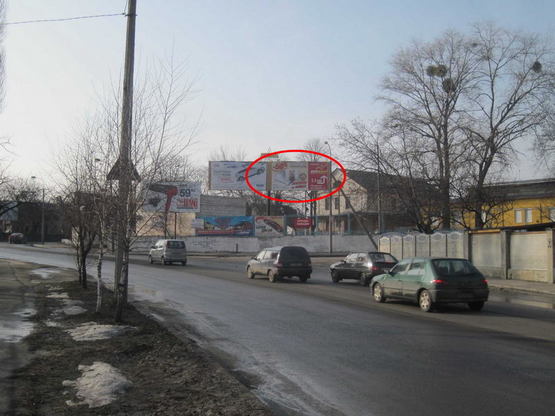 Фото рекламной плоскости по адресу вул. Поповича - Чернишова  ( ав/рем зав)