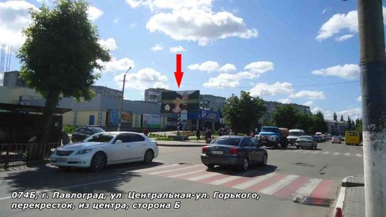 Фото рекламной плоскости по адресу ул. Центральная - ул. Горького, перекрёсток, из центра