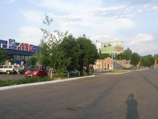 Фото рекламной плоскости по адресу ул.Харьковская, 26 "А" (АТБ, хоз.рынок)