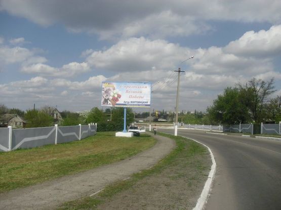 Фото рекламной плоскости по адресу ул.Харьковская,1 ( въезд в Терновку)