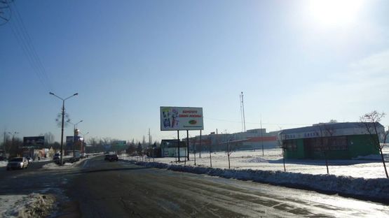 Фото рекламной плоскости по адресу ул.Харьковская, 26 "А" (АТБ, хоз.рынок, шахтёрская остановка)