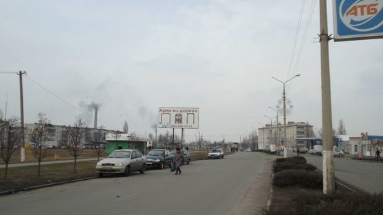 Фото рекламной плоскости по адресу ул.Харьковская, 26 "А" (напротив АТБ, хоз.рынок)