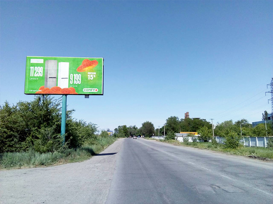 Фото рекламной плоскости по адресу ул.Сучкова в районе ж/д переезда