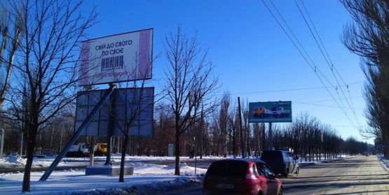 Фото рекламной плоскости по адресу ул. Киевская р-н д. 77
(в центр)