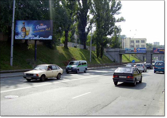 Фото рекламной плоскости по адресу ул.Федорова/ул.Боженко направление Протасов Яр (магазин)