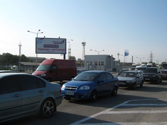 Фото рекламной плоскости по адресу Набережная_ЗАЗ_р. Московка _логистика