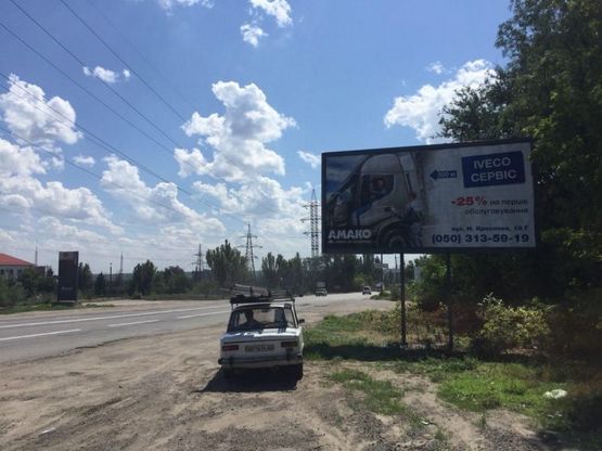 Фото рекламной плоскости по адресу Автомагістральна, перехрестя з вул.Краснова