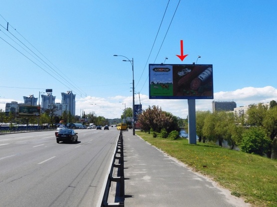 Фото рекламної площини за адресою Воссоединения пр-т, 5-й от моста Патона, ж/м Русановка, в центр