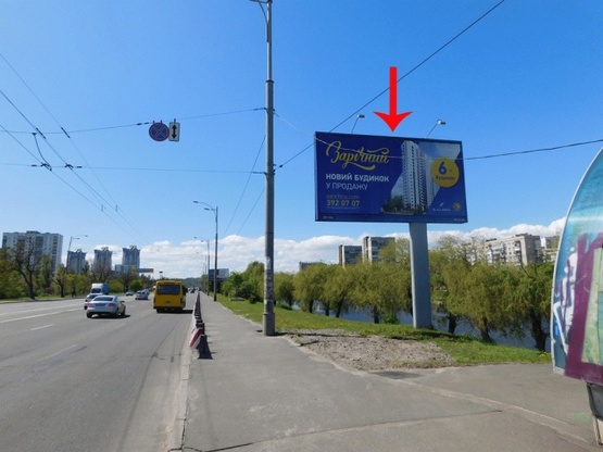 Фото рекламної площини за адресою Воссоединения пр-т, 7-й от моста Патона, ж/м Русановка, в центр