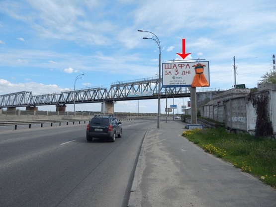 Фото рекламної площини за адресою Электриков ул., 100 м перед железнодорожным мостом