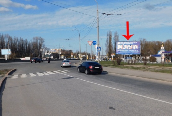 Фото рекламной плоскости по адресу Одесская пл., возле пр-та Глушкова, к Экспоцентру Украины, в центр