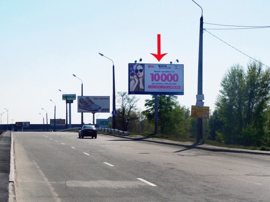 Фото рекламной плоскости по адресу Днепровская набережная, возле ст.м.Осокорки, сьезд с Днепровской наб.