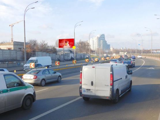 Фото рекламной плоскости по адресу Набережно-Рыбальская ул., 100 м перед железнодорожным мостом