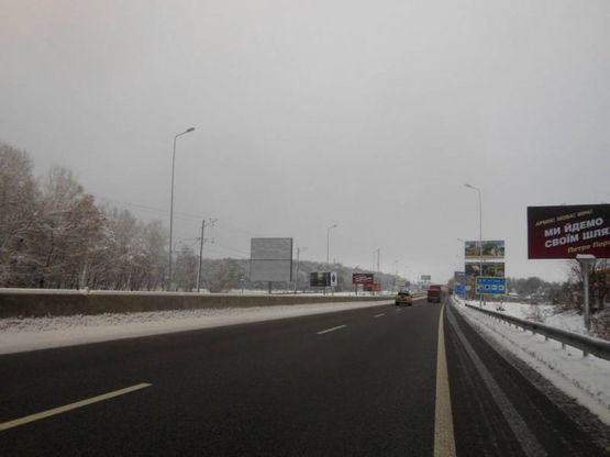 Фото рекламной плоскости по адресу Дніпровське шосе, траса Н-01 "Київ-Знам'янка", км 20+370 ліво