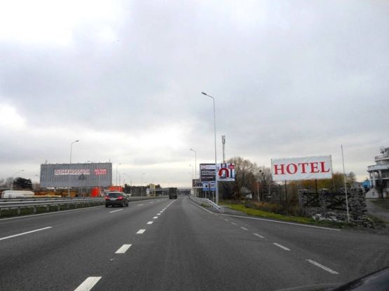 Фото рекламной плоскости по адресу Новообухівська траса, возле садового центру Ева, км 26+450 право