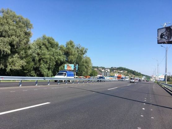 Фото рекламной плоскости по адресу Дніпровське шосе, за поворотом на  с.Лісники,  траса Н-01 "Київ-Знам'янка", км 21+080 право