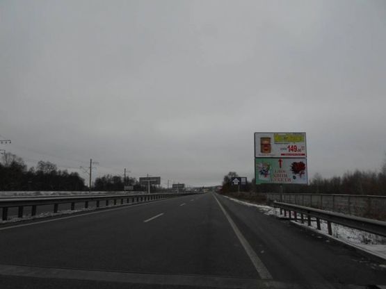 Фото рекламной плоскости по адресу Дніпровське шосе,  траса Н-01 "Київ-Знам'янка", км 21+590 право