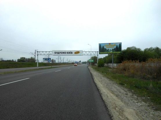 Фото рекламной плоскости по адресу Дніпровське шосе, траса Н-01 "Київ-Знам'янка", км 22км+050 право