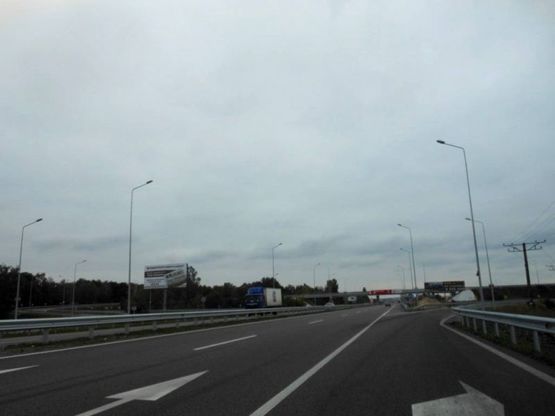 Фото рекламної площини за адресою Новообухівська траса, поворот на с.Креничі, км 25+100 лево