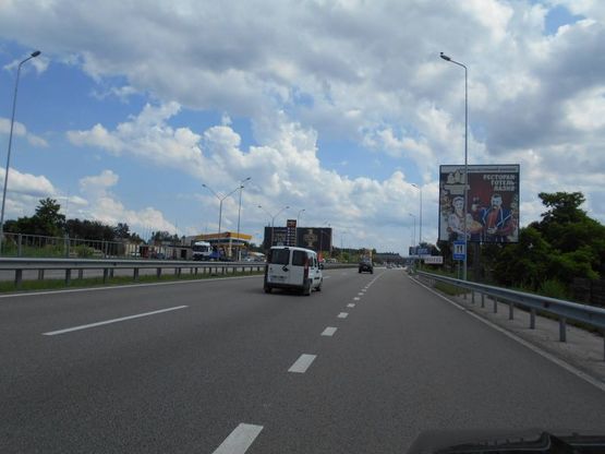 Фото рекламной плоскости по адресу Новообухівська траса, возле садового центру Ева, перед рестораном "Ранчо", км 26+400 право