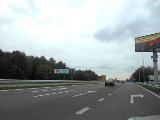 Фото рекламної площини за адресою Дніпровське шосе, поворот на с. Ходосеевка, напротив ТРЦ "Мегамаркет в Ходосіївці", "Киев-Обухов", км 24+050 лево