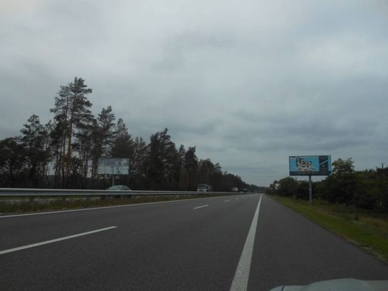 Фото рекламної площини за адресою Новообухівська траса 35+600 праворуч