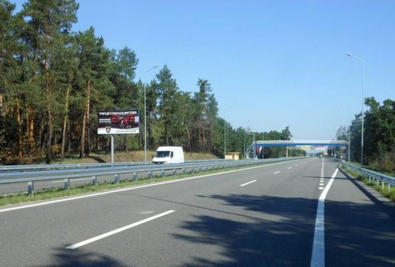 Фото рекламної площини за адресою Новообухівська траса, на пешеходном переходе, км 31+800 право