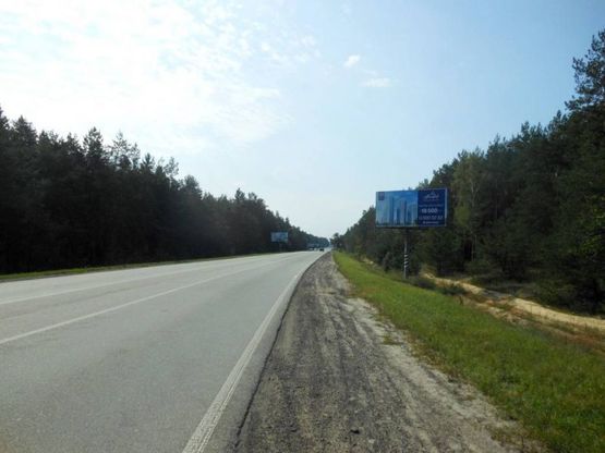 Фото рекламной плоскости по адресу Конча-Заспа, траса Р-02, км 34+100 право, поворот на с. Рудики