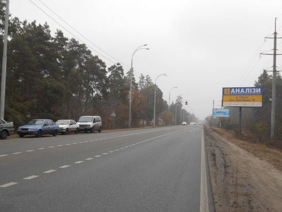 Фото рекламной плоскости по адресу Конча-Заспа, траса Р-02, км 32+150 право, поворот на с. П'ятихатки