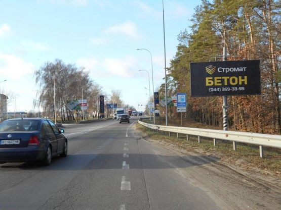 Фото рекламної площини за адресою м. Буча, траса М07, км 30+050 право, вул. Нове Шосе, біля ТЦ Модуль, Нова Лінія, ЕКО Маркет