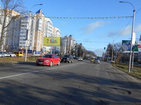 Фото рекламної площини за адресою м. Буча, траса М07, км 29+300 право, вул. Нове шосе,22, біля ресторану "Мі Амор", на світлофорі, ЖК "Гранд Бурже"