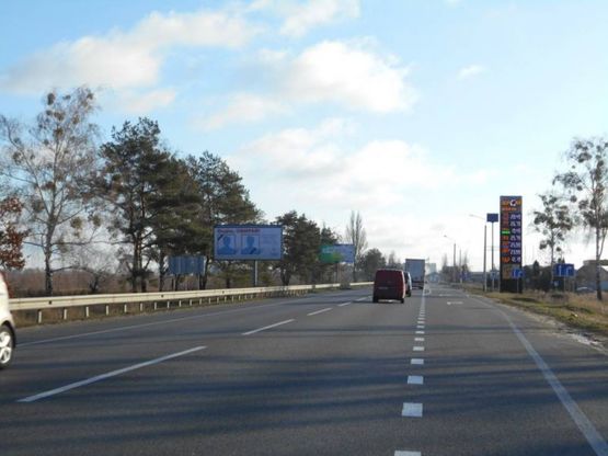 Фото рекламної площини за адресою м. Буча, траса М-07, км 32+000 праворуч, навпроти АЗК  "БРСМ", ЖК "Форест Ленд"