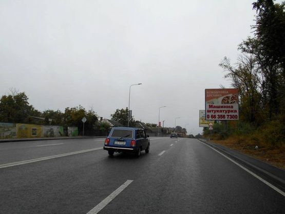Фото рекламной плоскости по адресу смт. Гостомель, траса М-07 Київ-Ковель, км 22+500 право, вул. Кулішова, 33