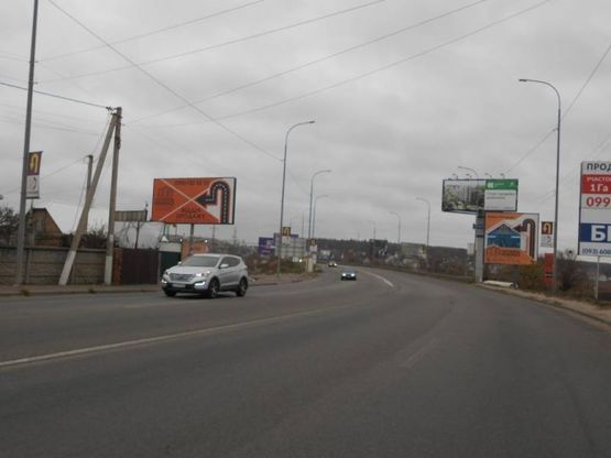 Фото рекламной плоскости по адресу м. Ірпінь, траса М-07, км 23+450 право