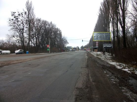 Фото рекламної площини за адресою вул. Декабристів, в'їзд у м. Васильків зі сторони Києва, перед зупинкою, перед АЗС КЛО