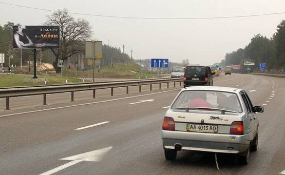 Фото рекламной плоскости по адресу новая Обуховская трасса/с.Безрадичи (В) на Обухов