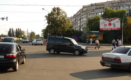 Фото рекламной плоскости по адресу Закревского/Сабурова/на углу дома 49/1 (А)