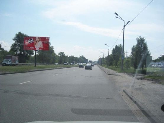 Фото рекламной плоскости по адресу Богатырская ул., ( 400 м. до  Оболонского пр-та, на Петровку)